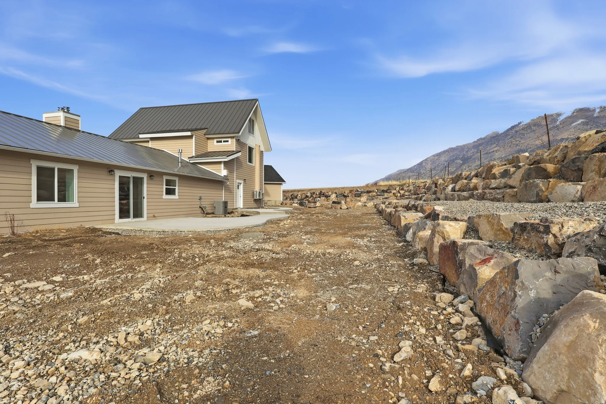 View of yard with a patio area and a mountain view