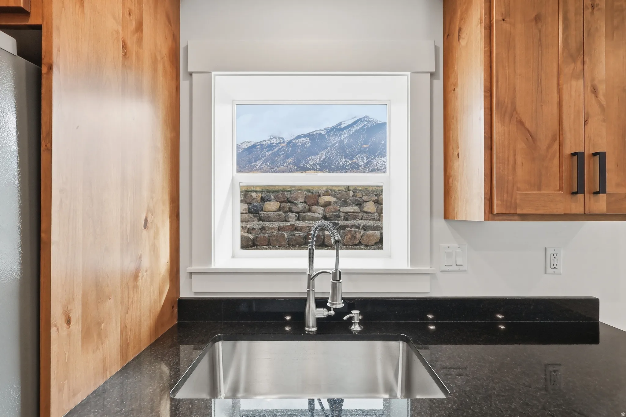 Kitchen sink window has view of the mountain