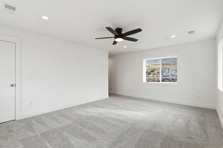 Master bedroom with recessed lighting, and ceiling fan