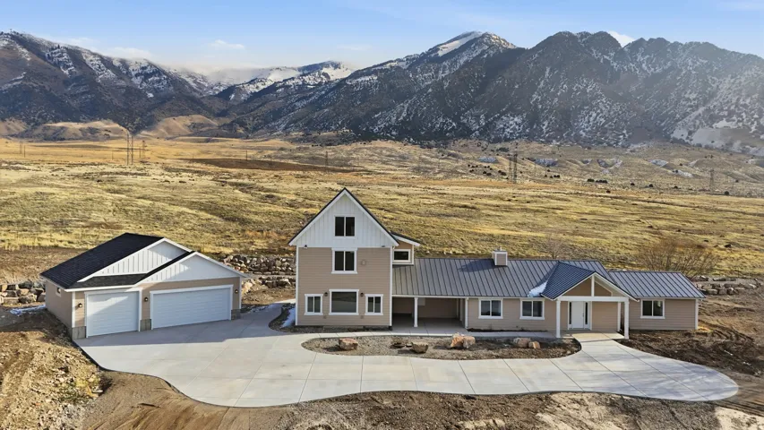 House faces west with mountain backdrop
