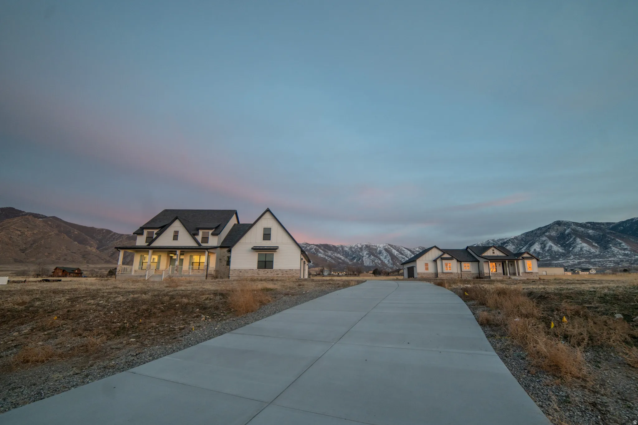 French provincial home featuring a mountain view and covered porch