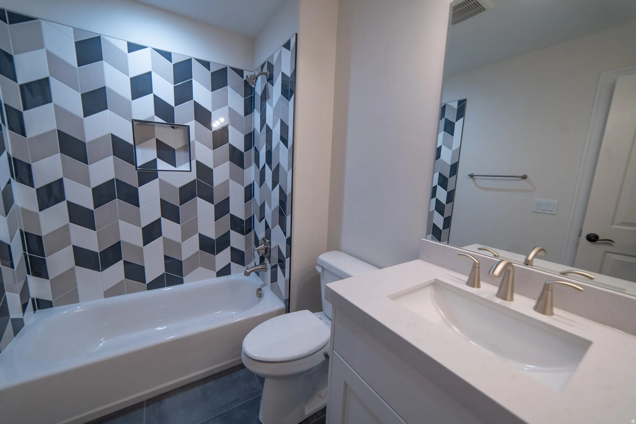 Full bathroom featuring shower / tub combo with curtain and vanity