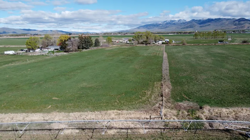 View of yard featuring a view of countryside and a mountain view