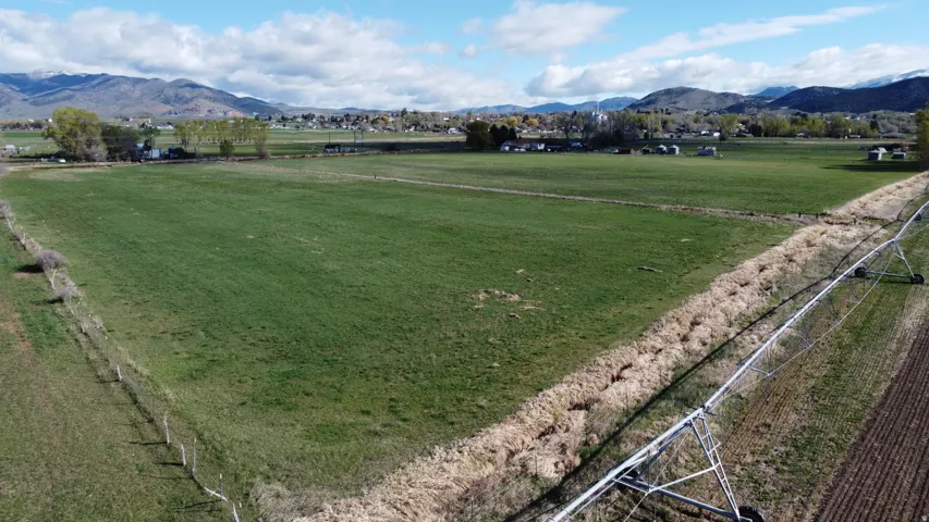 Surrounding community featuring a mountain view and a view of rural / pastoral area