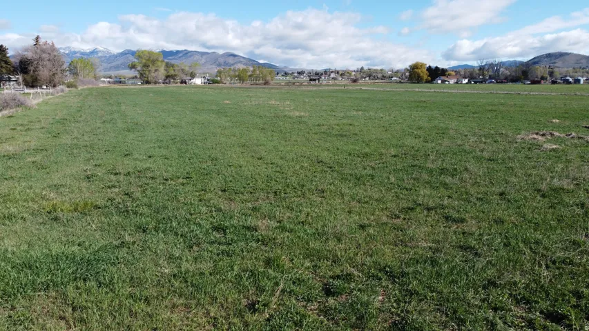 View of property's community with a mountain view and a rural view