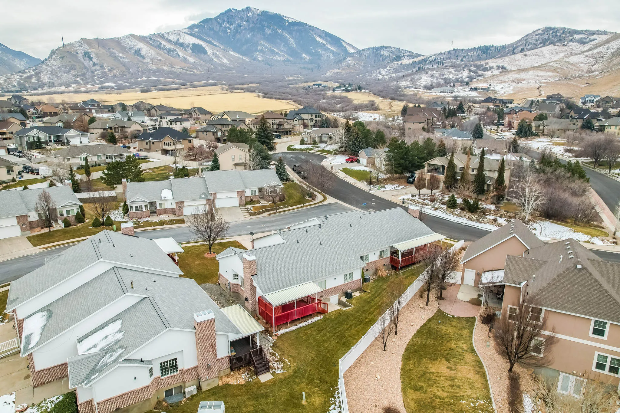 Aerial view of residential area with a mountain backdrop