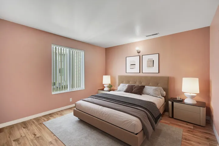 Bedroom with baseboards and light wood-style flooring