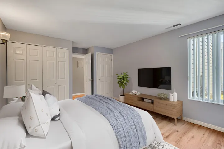 Bedroom featuring a closet and wood finished floors
