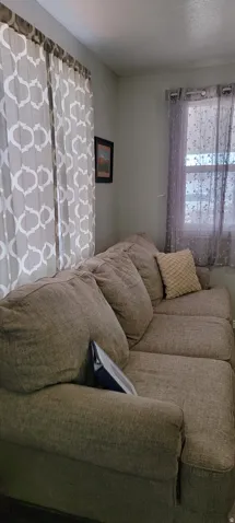 Living room featuring a textured ceiling