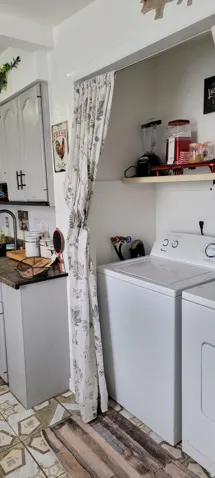 Laundry room featuring washer and dryer