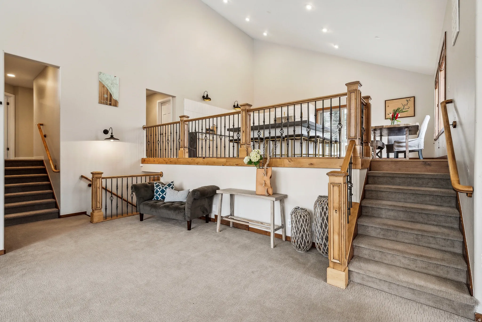 Stairway featuring carpet, recessed lighting, and a towering ceiling