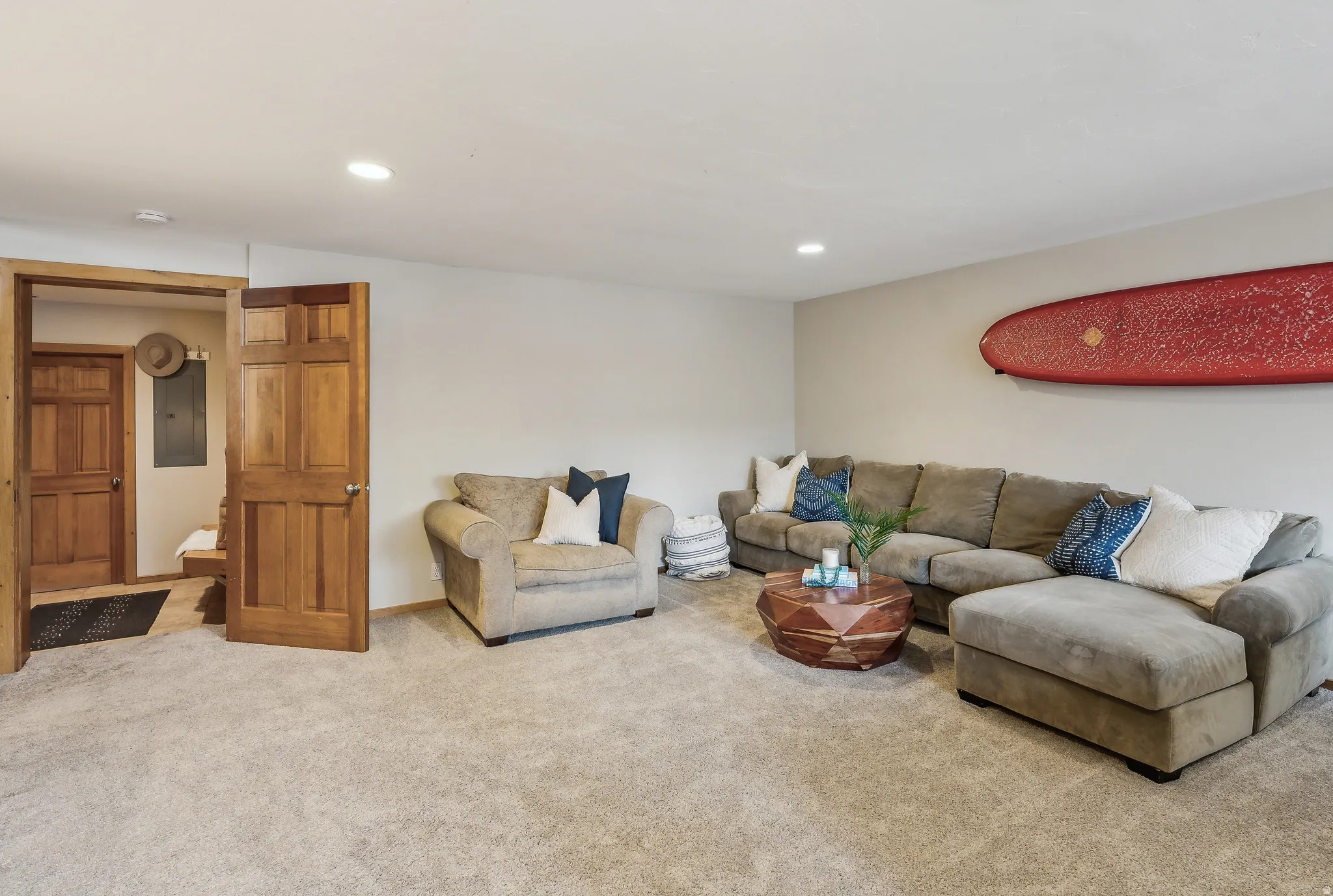 Carpeted flooring throughout, recessed lighting, and solid wood interior doors