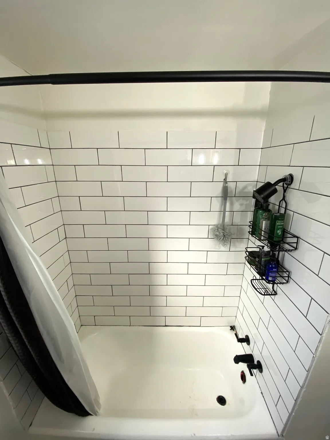 Full bathroom with shower / bath combo