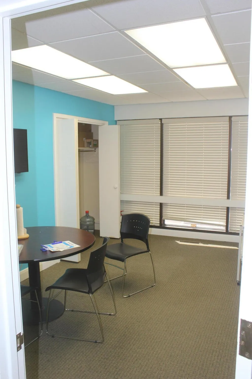 Office featuring a paneled ceiling