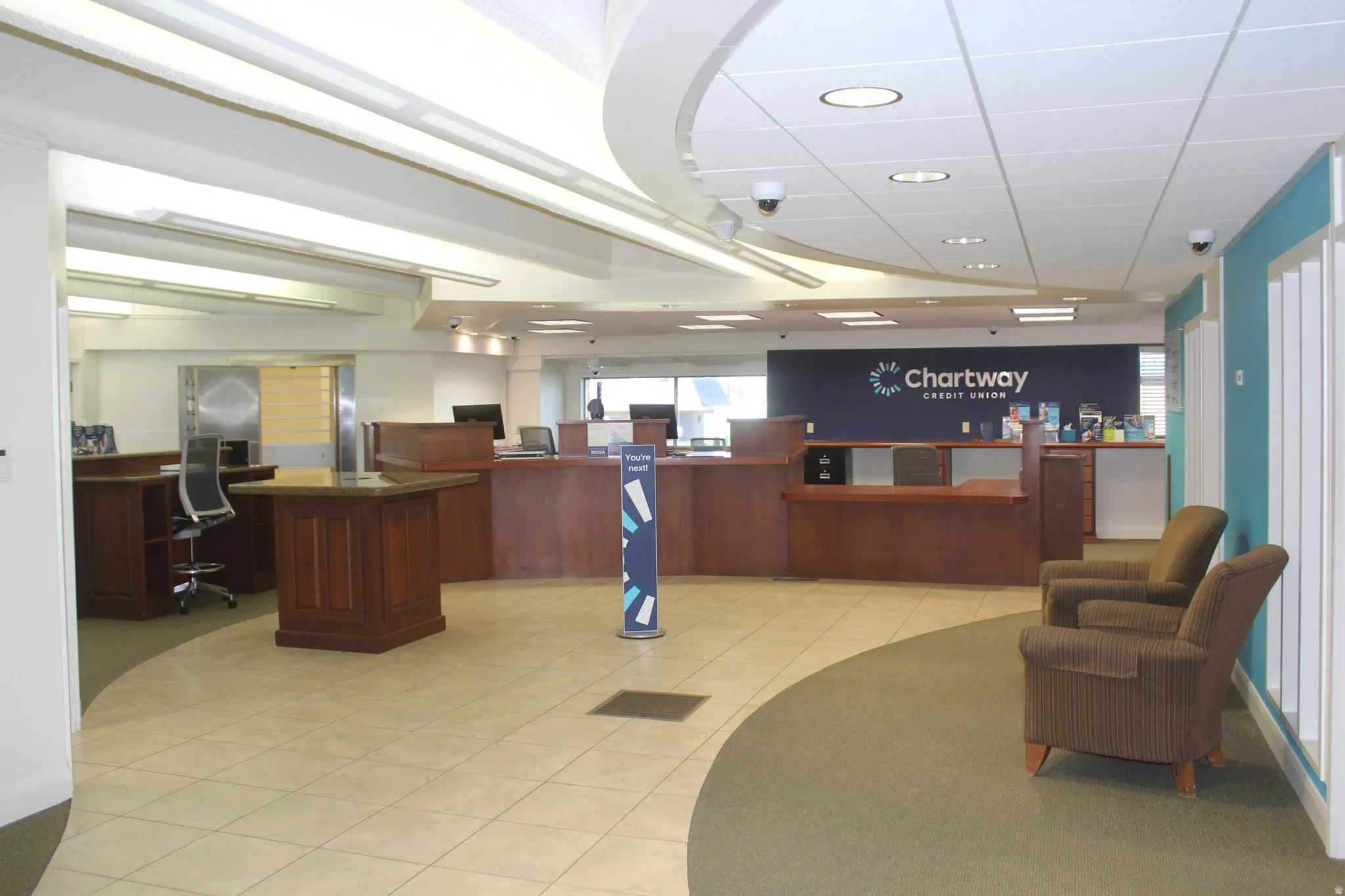 Reception featuring a paneled ceiling