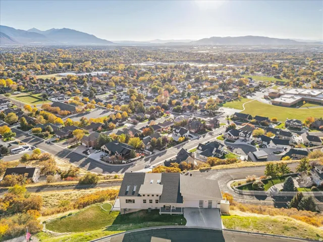 Aerial perspective of suburban area with mountains
