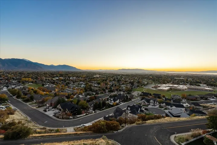 Aerial view of residential area with a mountainous background
