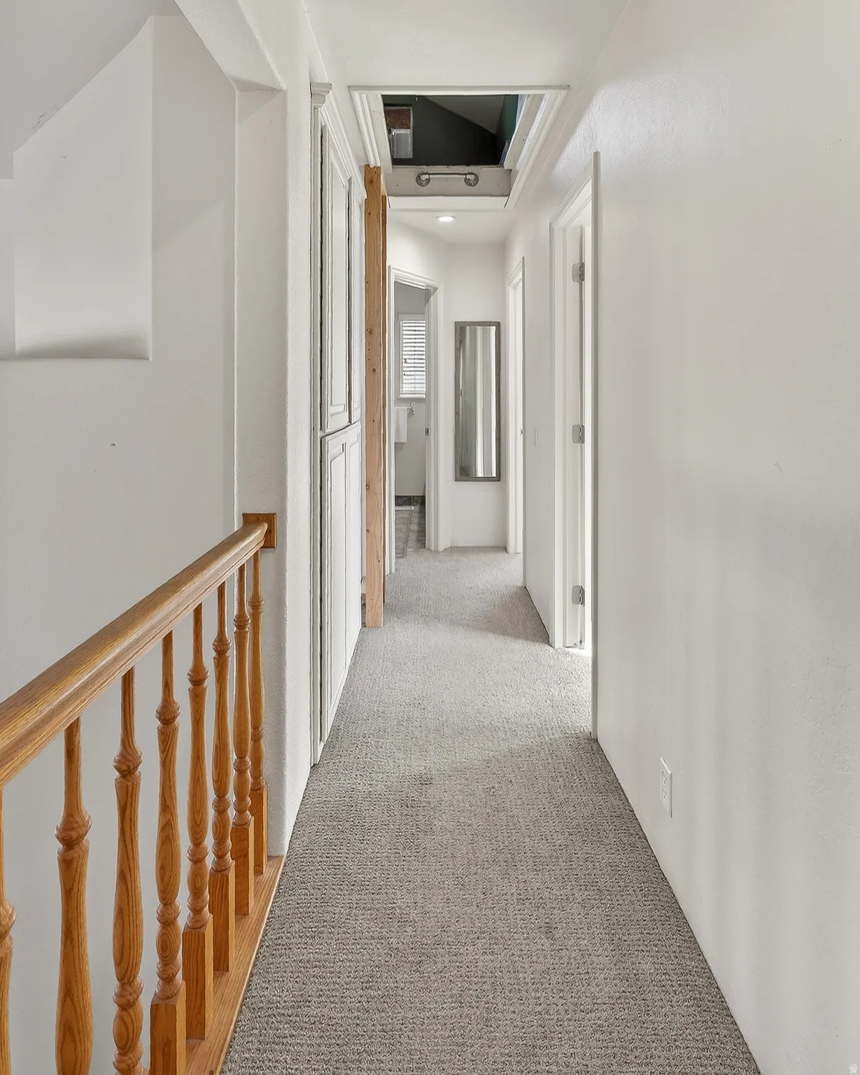 Corridor with carpet flooring