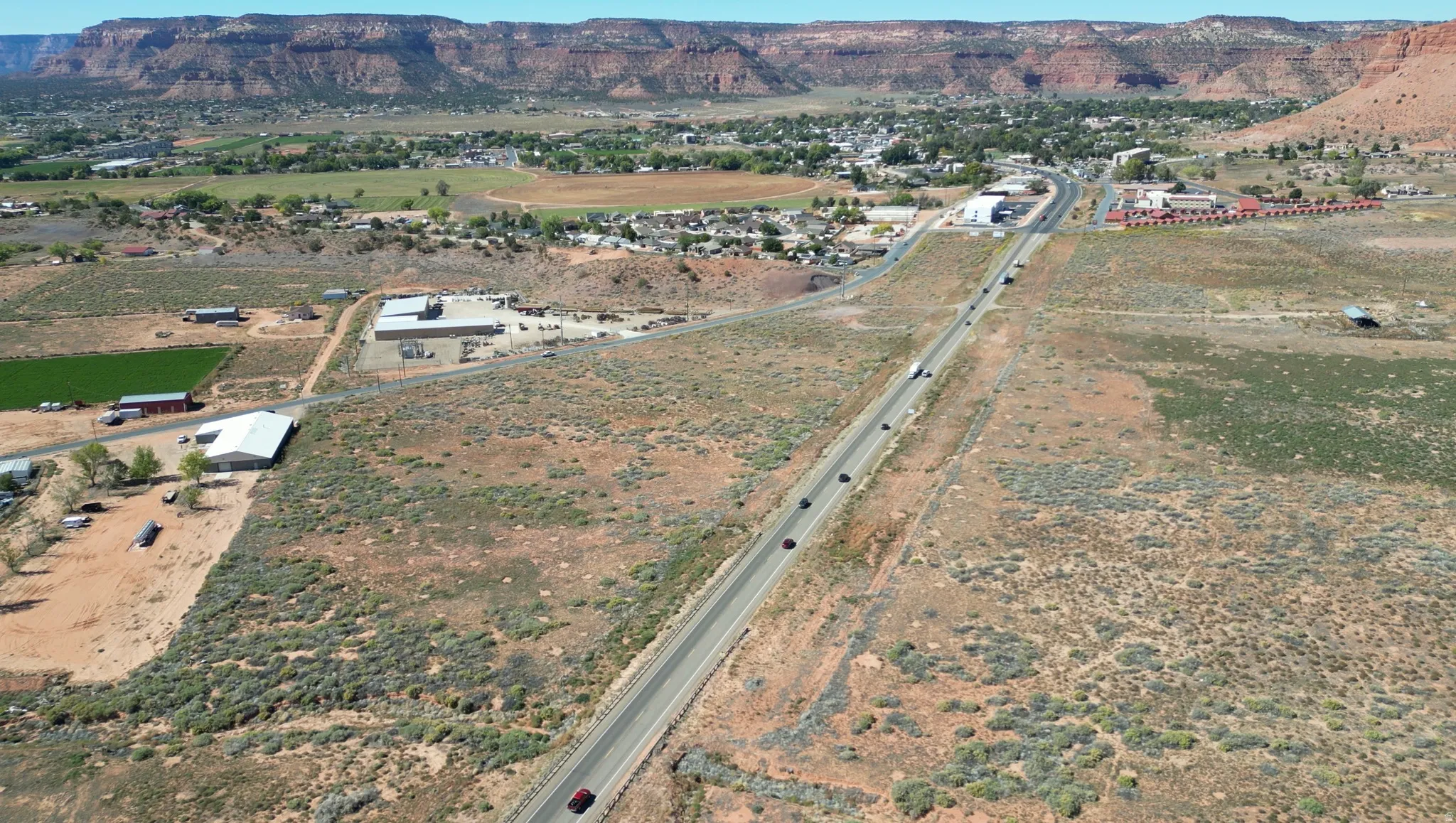 Aerial overview of property's location with mountains and rural landscape