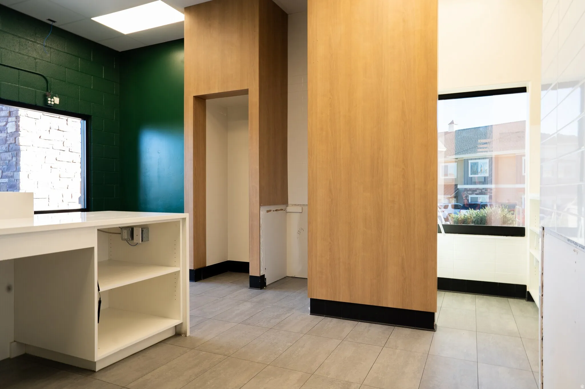 Kitchen with light stone counters