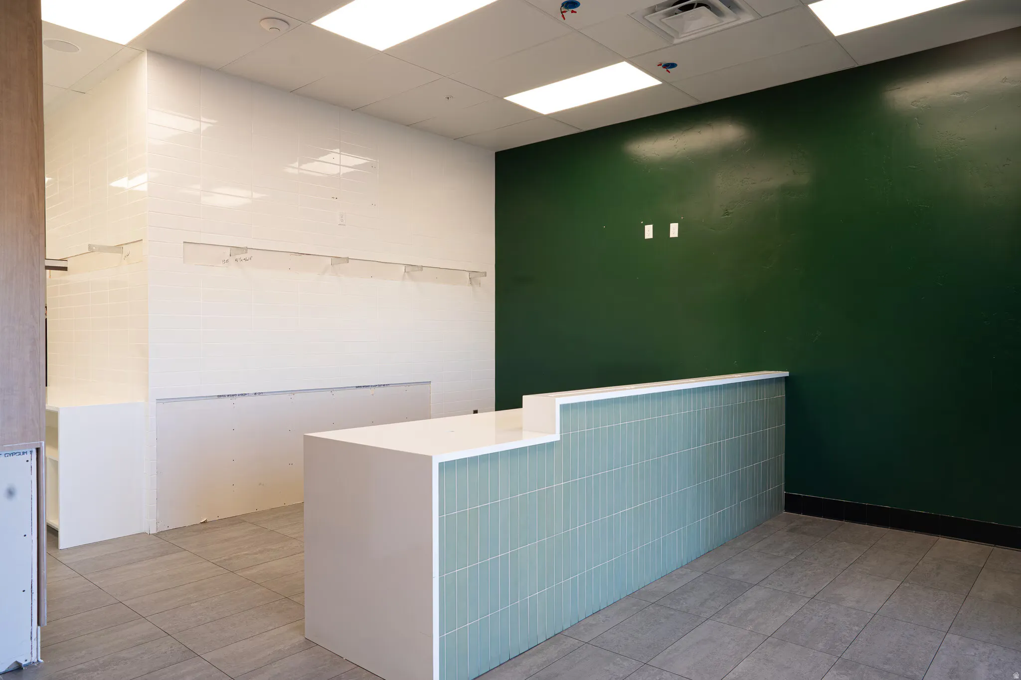 Reception area featuring a drop ceiling