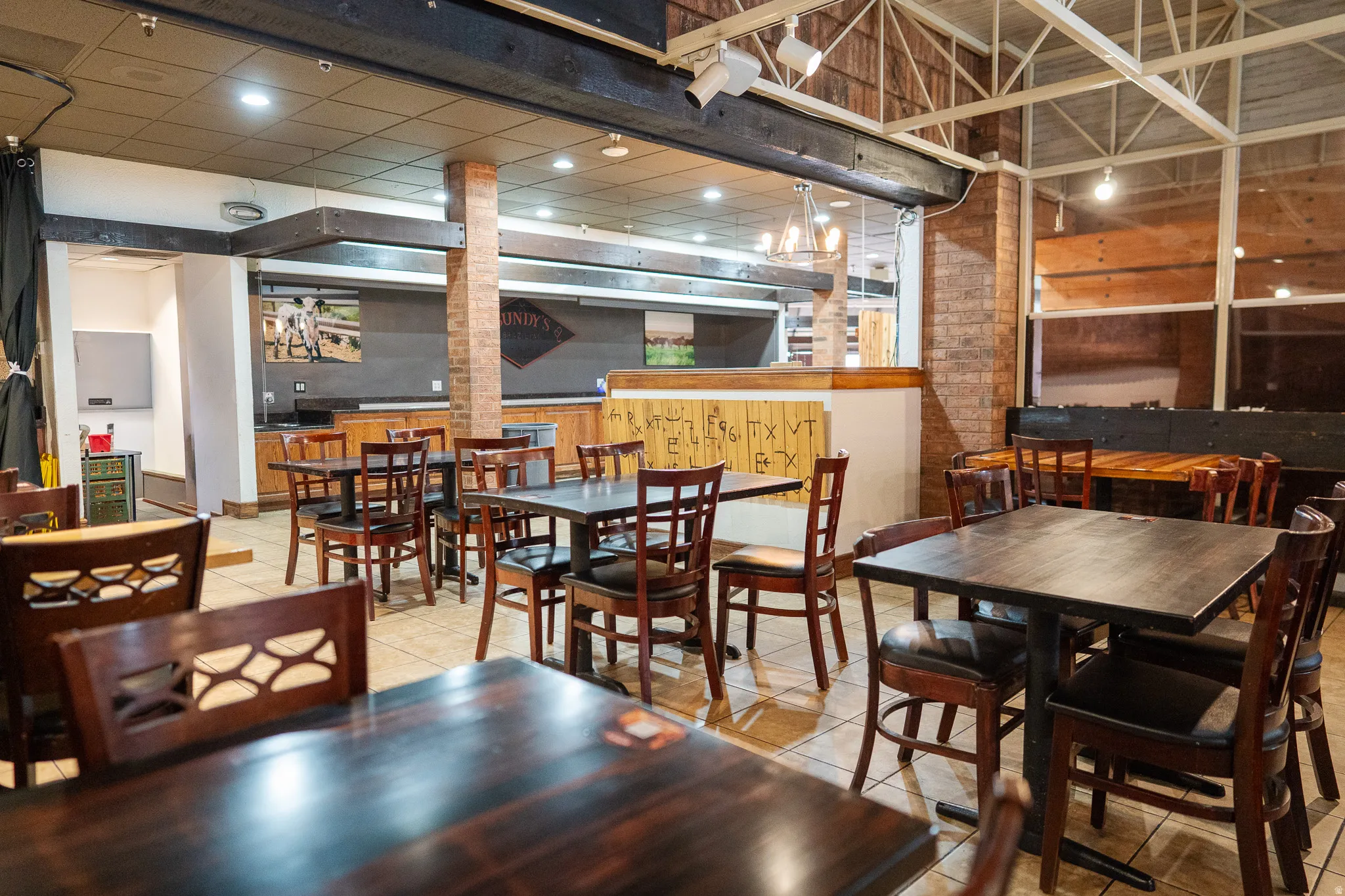 Dining room with tile patterned flooring and recessed lighting