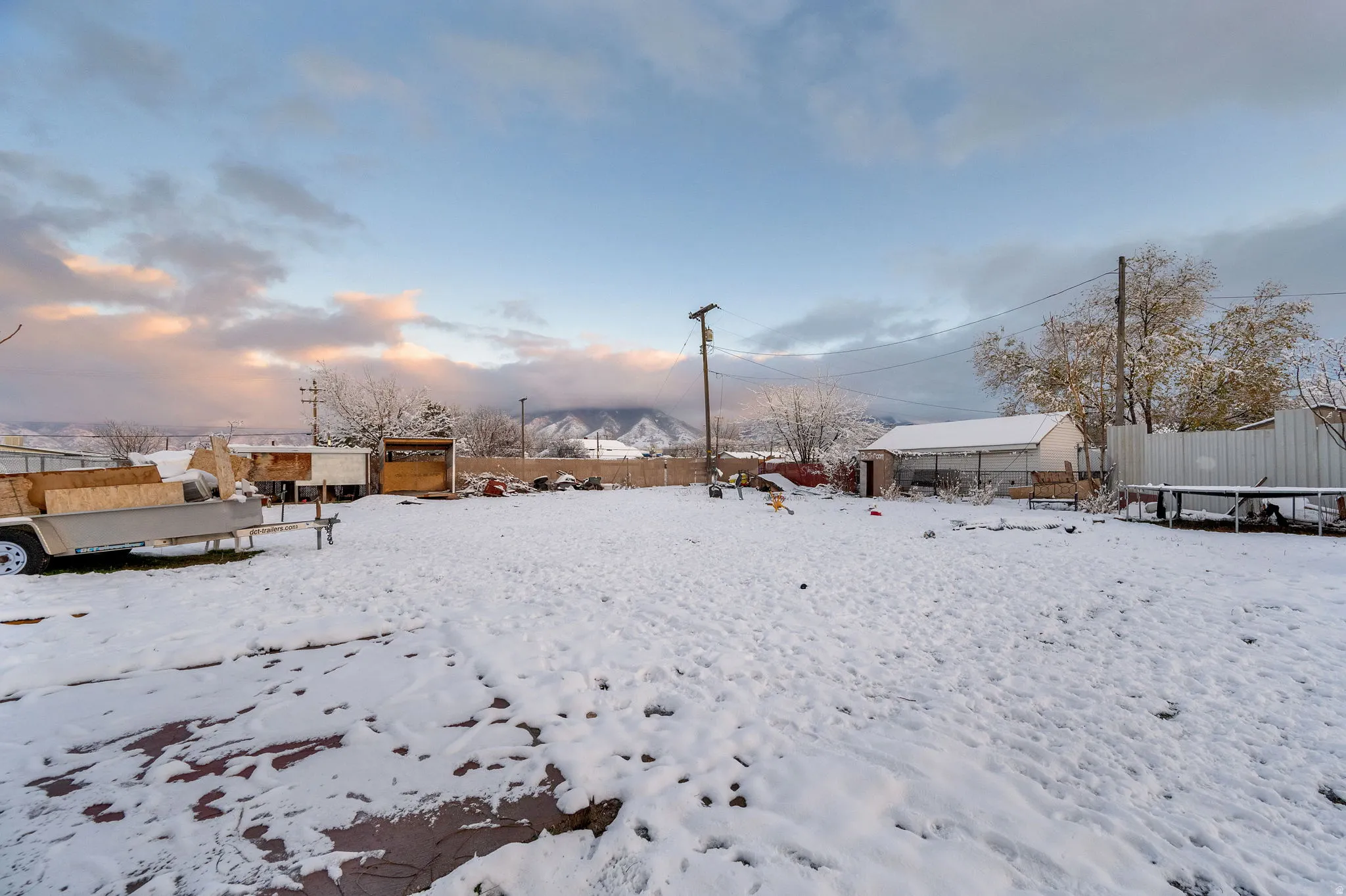View of yard covered in snow