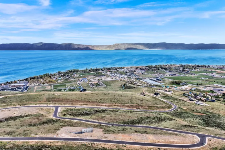 Expansive body of water with distant mountainous terrain