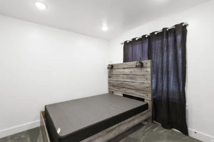 Bedroom featuring carpet floors
