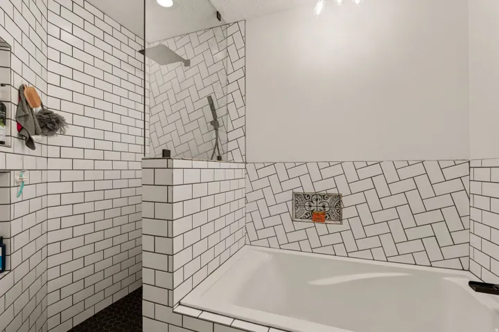 Bathroom featuring a garden tub and a walk in shower