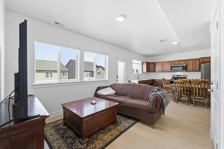 Living room with light wood finished floors