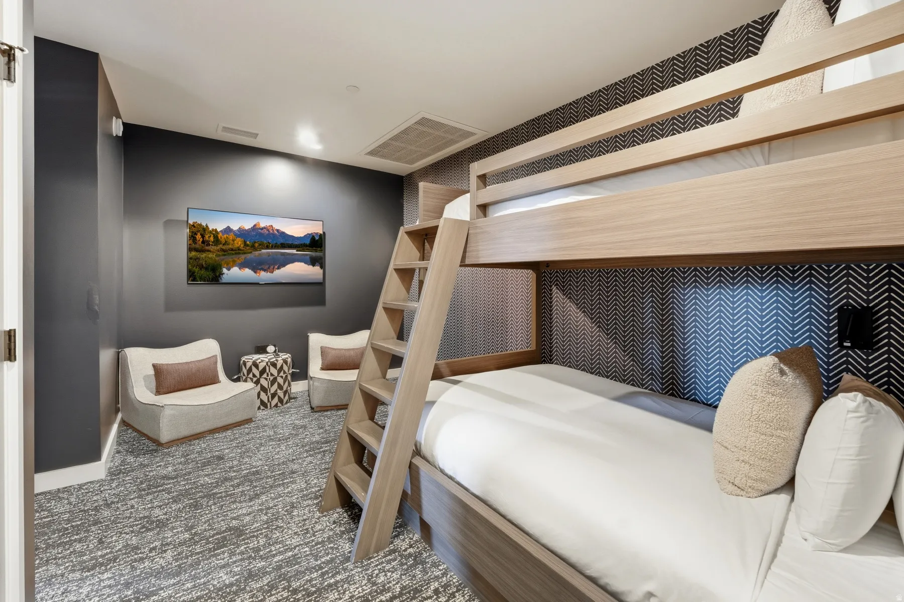 Bedroom featuring carpet flooring and baseboards