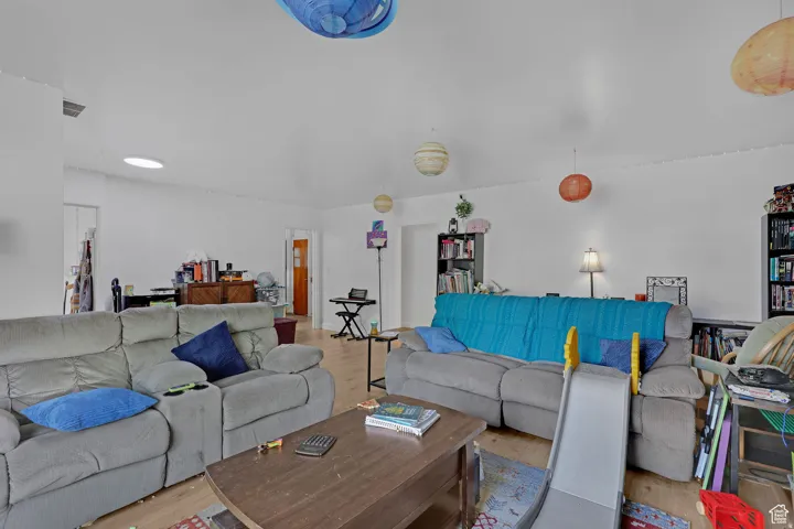 Living area with wood finished floors
