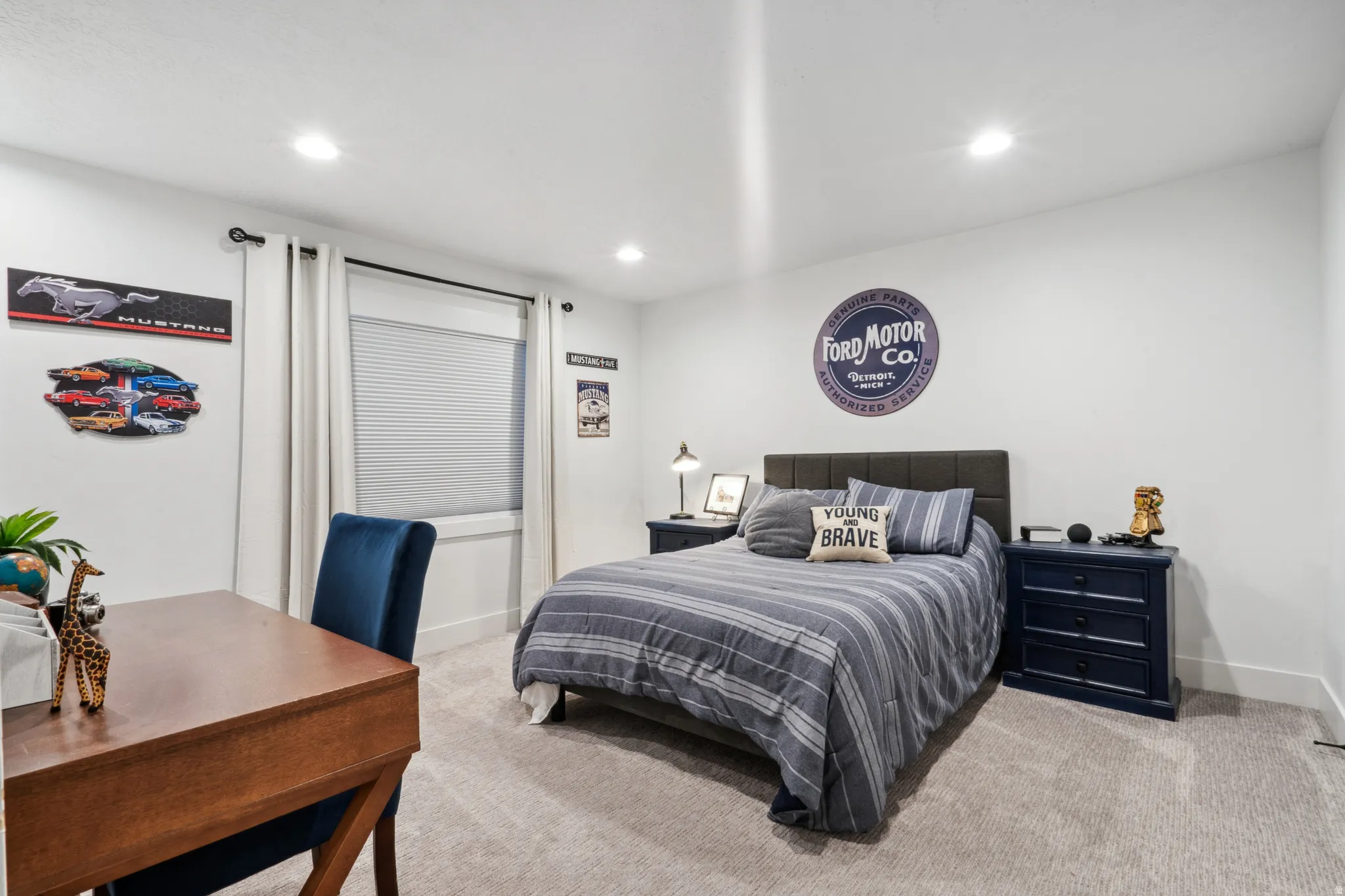 5th bedroom with light carpet and recessed lighting