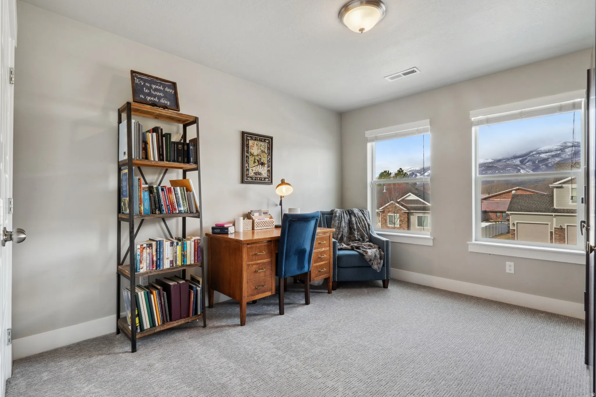 3rd bedroom featuring carpet flooring and baseboards