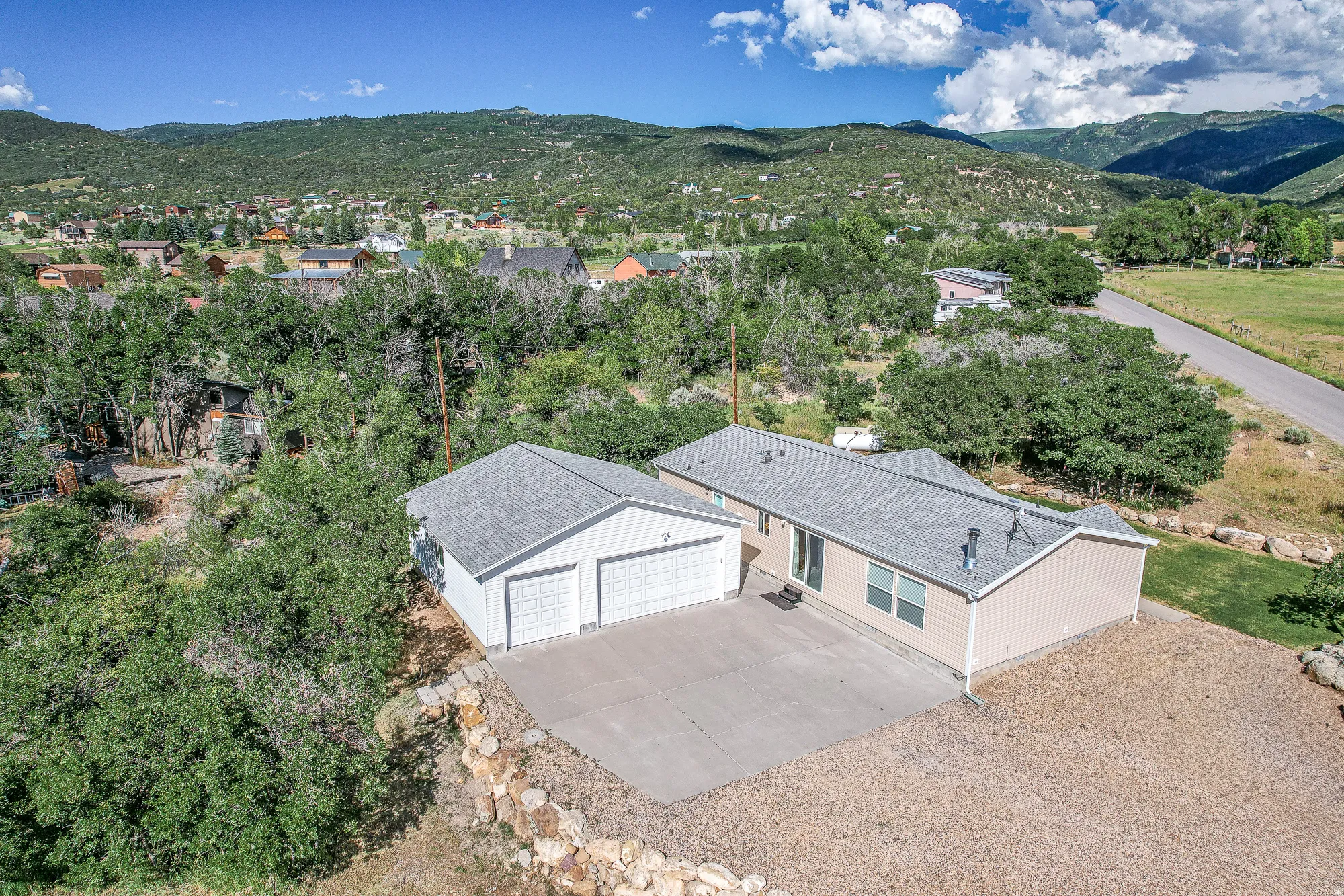 View of subject property with a mountainous background