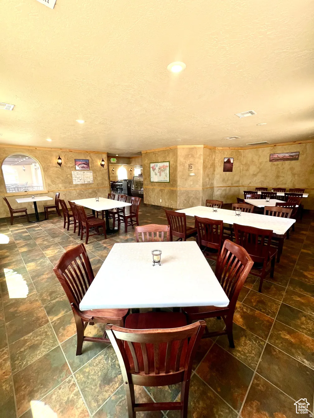 Dining room with a textured ceiling