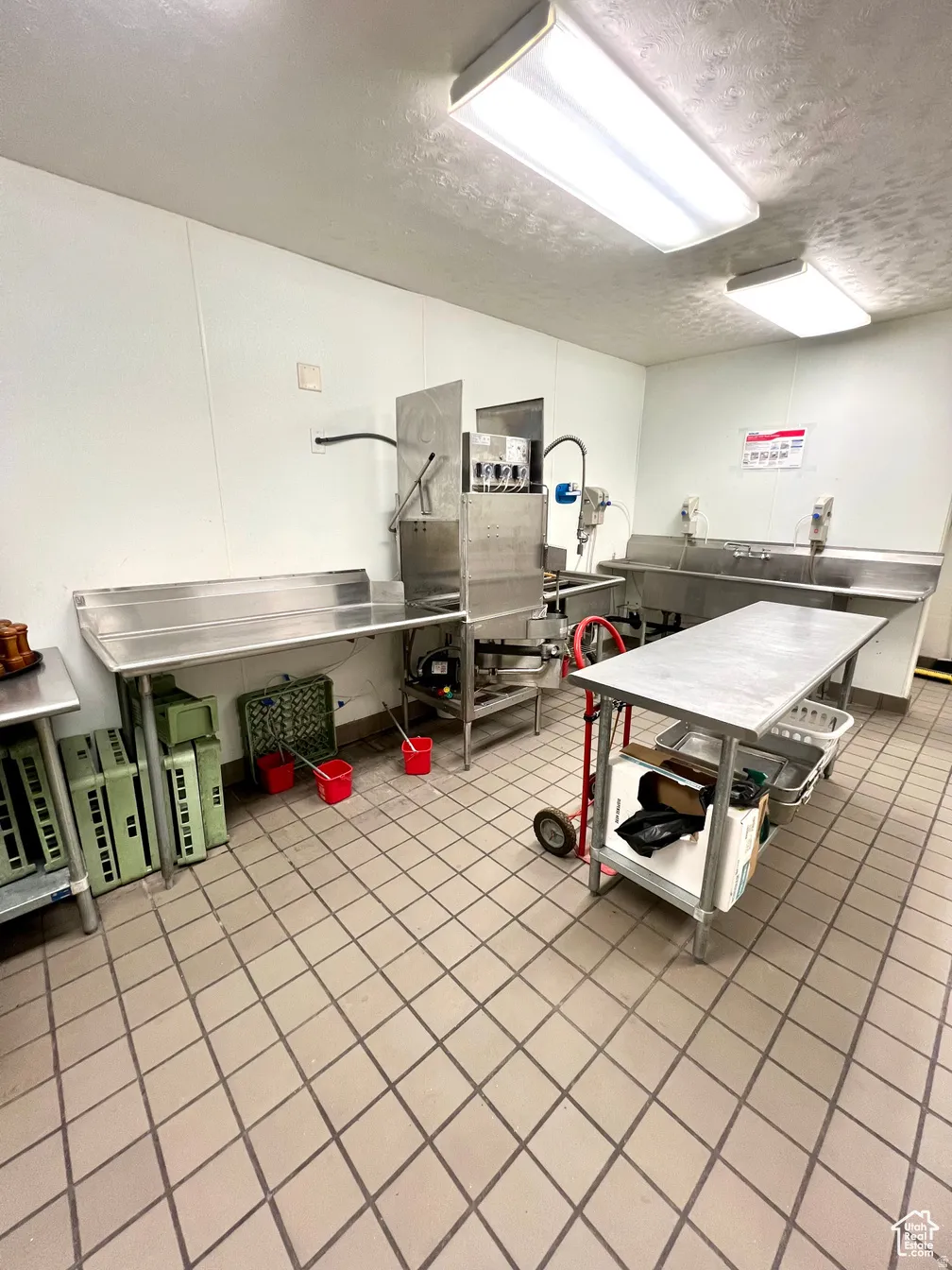 Playroom with a textured ceiling