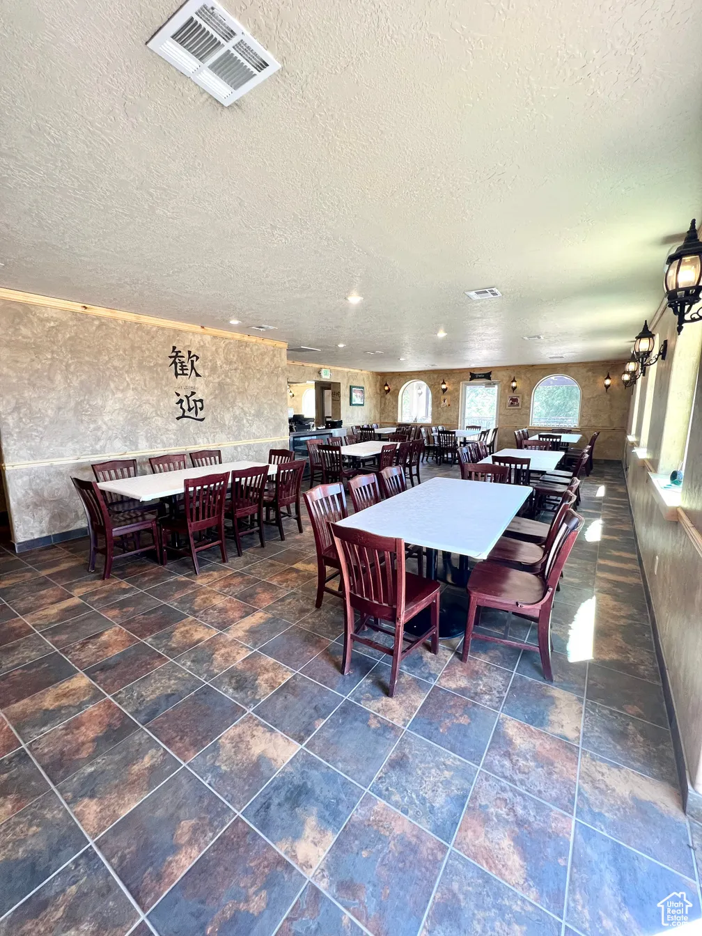 Dining space featuring a textured ceiling