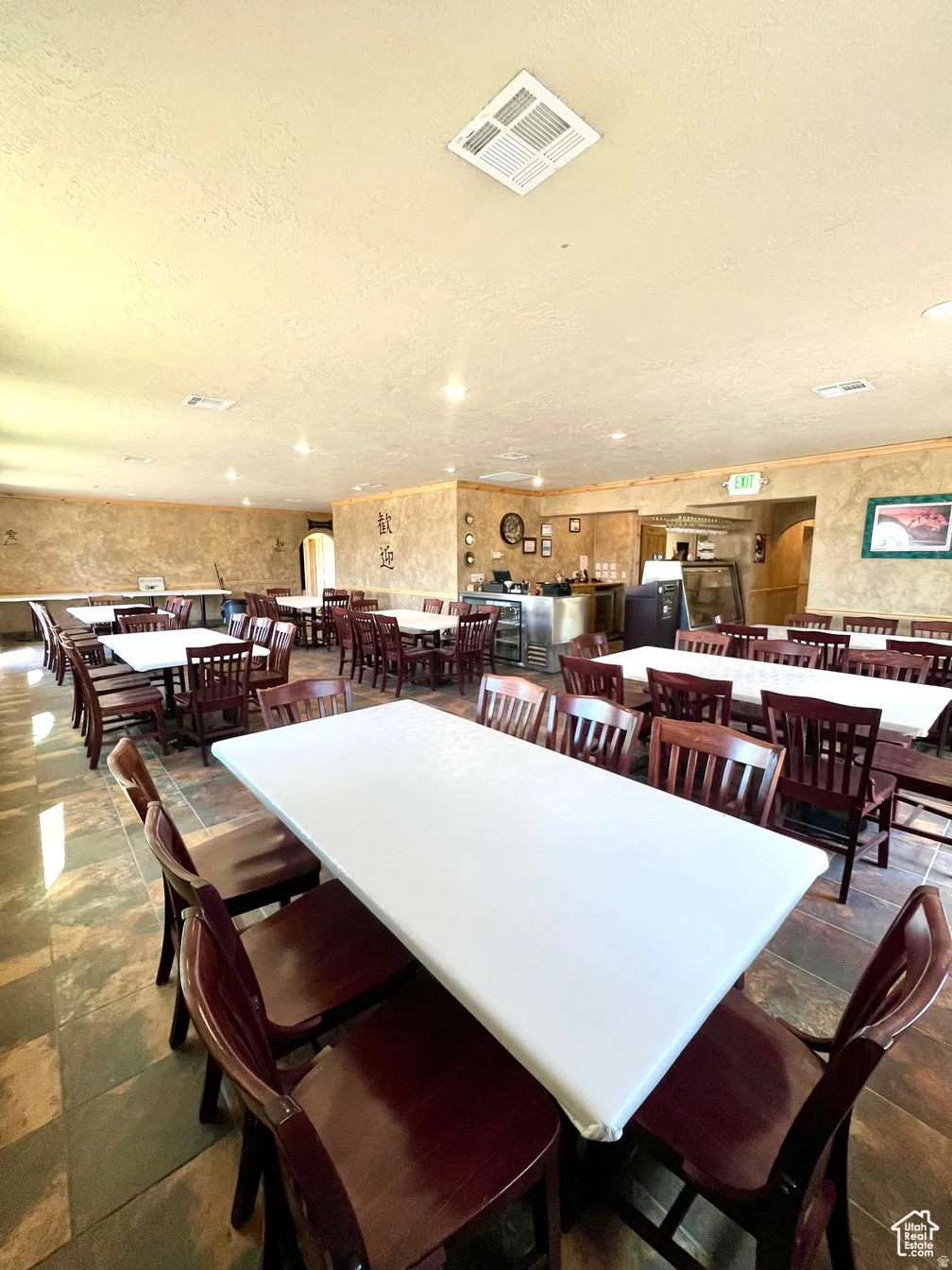 Dining room featuring a textured ceiling