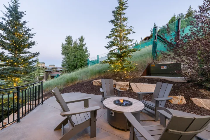 View of patio featuring a fire pit