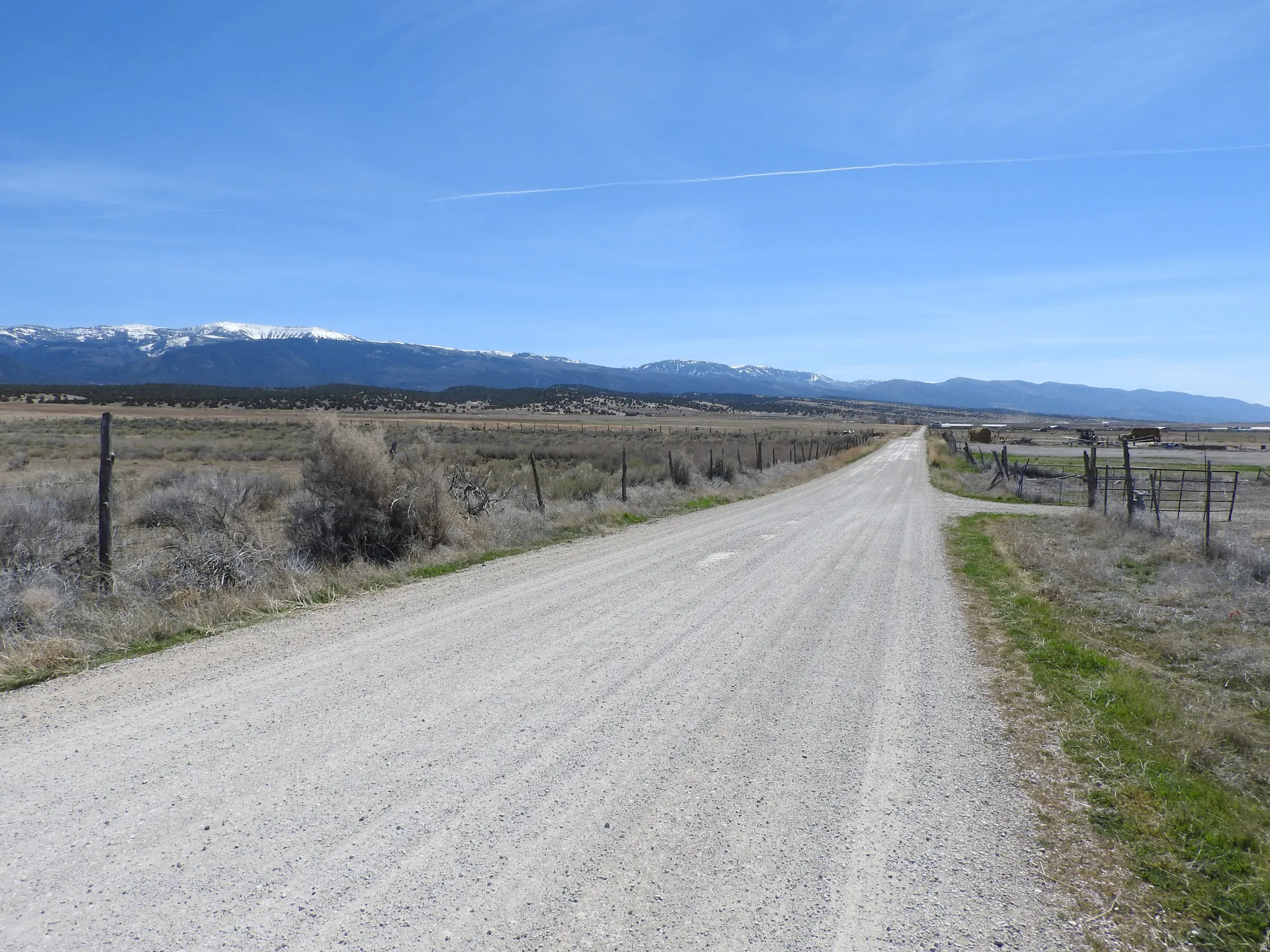 View of road featuring a view of rural / pastoral area and a mountain view