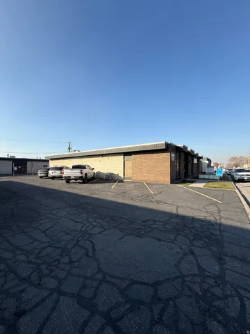 Exterior space with uncovered parking