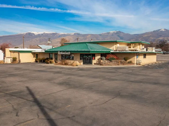 View of building exterior featuring a mountain view