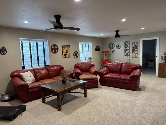 Living room with carpet floors and recessed lighting