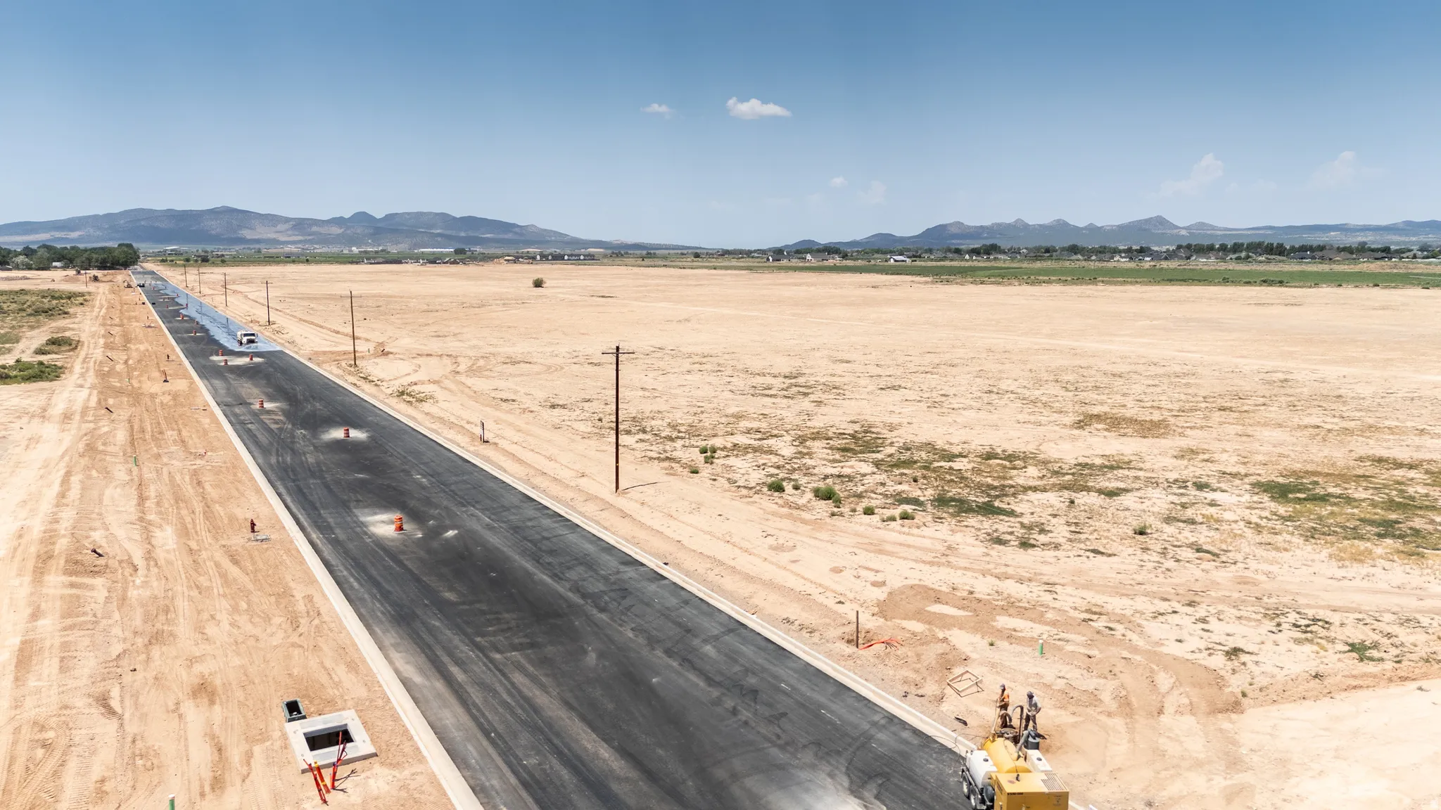 View of yard with a mountain view and a view of rural / pastoral area