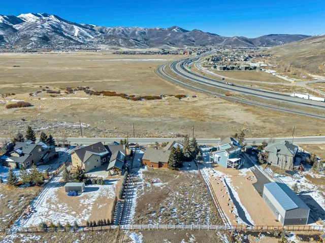 Aerial view of residential area with a mountainous background