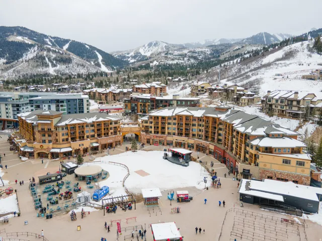 Snowy aerial view featuring a mountain view