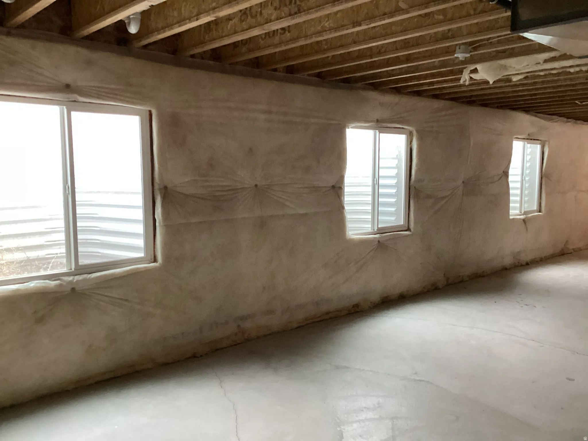 Basement featuring healthy amount of natural light