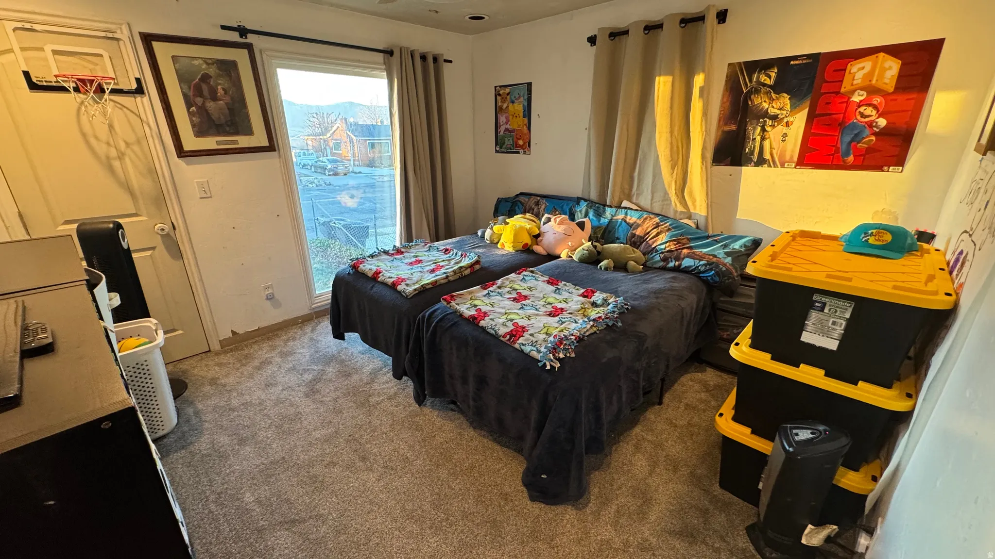 Carpeted bedroom with access to outside and baseboards